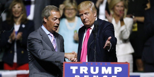 JACKSON, MS - AUGUST 24: Republican Presidential nominee Donald Trump, right, invites United Kingdom Independence Party leade
