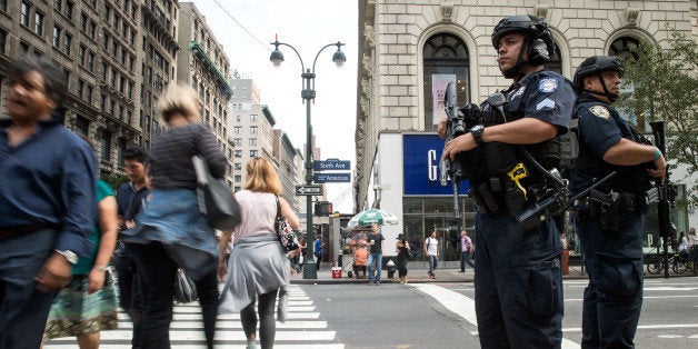 NEW YORK, NY - SEPTEMBER 18: Members of the New York City Police Department stand guard in Herald Square, September 18, 2016 in New York City. Following Saturday night's explosion in the Chelsea neighborhood of Manhattan, Mayor Bill de Blasio has promised a 'substantial' police presence throughout the week. New York Governor Andrew Cuomo also said an additional 1,000 New York State and National Guard troops will patrol transit stations and airports as a precaution. (Photo by Drew Angerer/Getty Images)