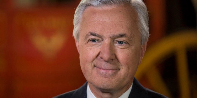 John Stumpf, chairman and chief executive officer of Wells Fargo & Co., smiles during a Bloomberg Television interview in San Francisco, California, U.S., on Wednesday, Oct. 21, 2015. 'The biggest risk to the U.S. economy is what's happening outside the U.S.,' Stumpf said while discussing topics such as the level and pace of Federal Reserve interest-rate increases, cybersecurity and the banks conservative approach to risk. Photographer: David Paul Morris/Bloomberg via Getty Images