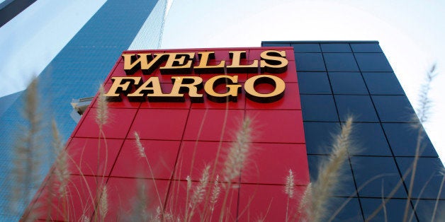 A Wells Fargo bank is pictured in Dallas, Texas October 9, 2008. Shares of Wachovia Corp slumped about 16 percent on concern talks to divvy up the troubled bank had hit a snag, leading a broader drop in U.S. regional banks. Wachovia shares, as well as those of competing buyers Wells Fargo & Co and Citigroup Inc, dropped after the Wall Street Journal reported talks between the three about potentially splitting Wachovia were hung up on several issues. REUTERS/Jessica Rinaldi (UNITED STATES)