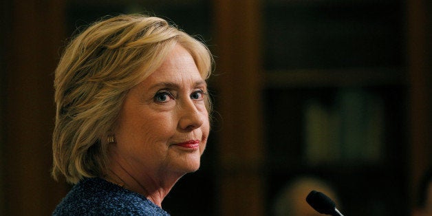 U.S. Democratic presidential candidate Hillary Clinton speaks to reporters after holding a "National Security Working Session