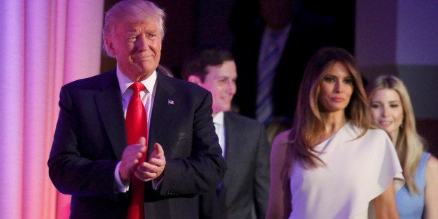 Republican U.S. president-elect Donald Trump stands wife Melania and family at his election night rally in Manhattan, New Yor