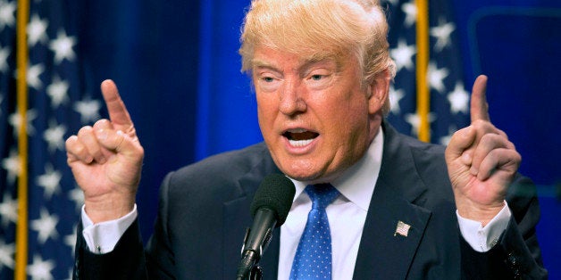 Republican presidential candidate Donald Trump speaks at Saint Anselm College Monday, June 13, 2016, in Manchester, N.H. Trump attacked Hilary Clinton by name in his speech in the aftermath of the Orlando shooting. Clinton did not mention Trump by name in her speech an hour earlier. During the national security speech, Trump repeatedly criticized Clinton's immigration plan, her attempts to tighten the nation's gun control laws and for not using the phrase "radical Islamic terrorism" when describing recent attackers. (AP Photo/Jim Cole)