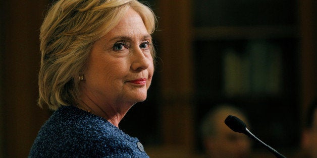 U.S. Democratic presidential candidate Hillary Clinton speaks to reporters after holding a "National Security Working Session" with national security advisors in New York, U.S. September 9, 2016. REUTERS/Brian Snyder