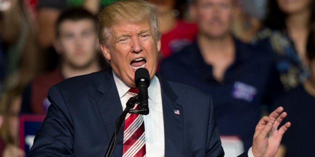 Republican presidential candidate Donald Trump gestures during a rally in Roanoke, Va., Saturday, Sept. 24, 2016. Trump faces