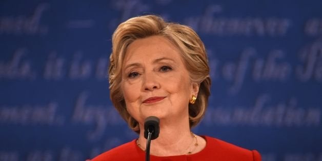 Democratic nominee Hillary Clinton smiles during the first presidential debate at Hofstra University in Hempstead, New York o