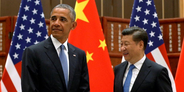 U.S. President Barack Obama and China's President Xi Jinping arrive for a bilateral meeting ahead of the G20 Summit, at West