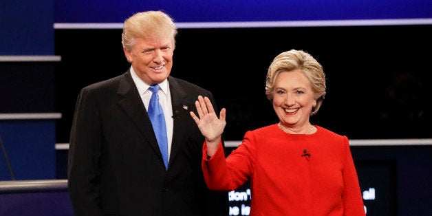 Republican presidential nominee Donald Trump and Democratic presidential nominee Hillary Clinton are introduced during the presidential debate at Hofstra University in Hempstead, N.Y., Monday, Sept. 26, 2016. (AP Photo/David Goldman)