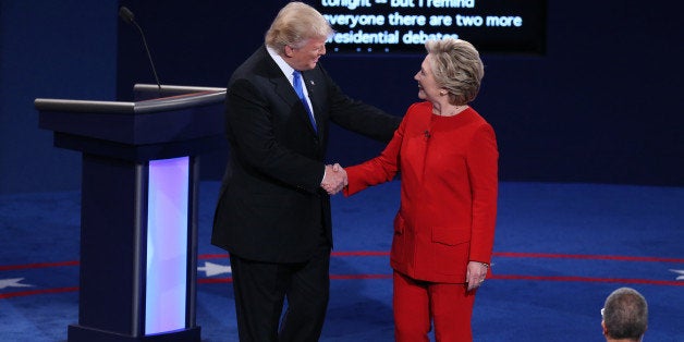 Donald Trump, 2016 Republican presidential nominee, shakes hands with Hillary Clinton, 2016 Democratic presidential nominee, during the first U.S. presidential debate at Hofstra University in Hempstead, New York, U.S., on Monday, Sept. 26, 2016. Clinton and Trump meet Monday night for a presidential debate that will give them their broadest exposure to voters and promises to be a pivotal moment in a long and increasingly close race. Photographer: Daniel Acker/Bloomberg via Getty Images