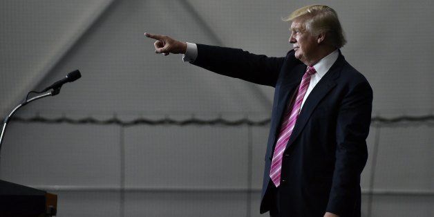 Republican presidential nominee Donald Trump gestures following a rally at Spooky Nook Sports center in Manheim, Pennsylvania on October 1, 2016. / AFP / Mandel Ngan (Photo credit should read MANDEL NGAN/AFP/Getty Images)