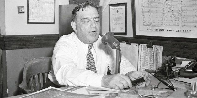 (Original Caption) New York, New York: Mayor La Guardia, who played a very important part in quelling the riot in Harlem, is shown at microphone making his fourth radio address to the people of Harlem. The Mayor said the situation was 'under complete control.'