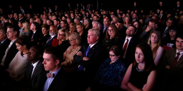 Members of the audience watch as Democratic U.S. vice presidential nominee Senator Tim Kaine and Republican U.S. vice presidential nominee Governor Mike Pence participate in their vice presidential debate at Longwood University in Farmville, Virginia, U.S., October 4, 2016. REUTERS/Kevin Lamarque TPX IMAGES OF THE DAY 