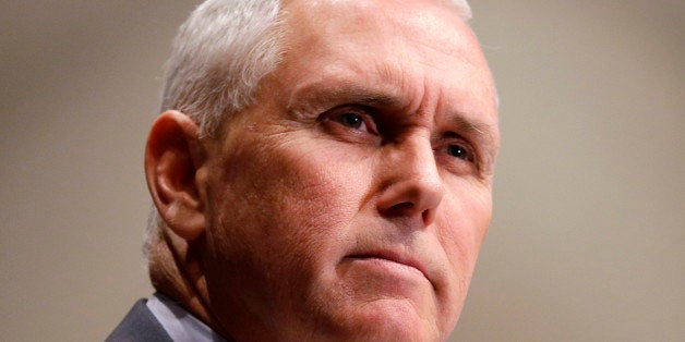 FILE - In this Jan. 27, 2015 file photo, Indiana Gov. Mike Pence pauses while speaking in Indianapolis. As they begin to shap
