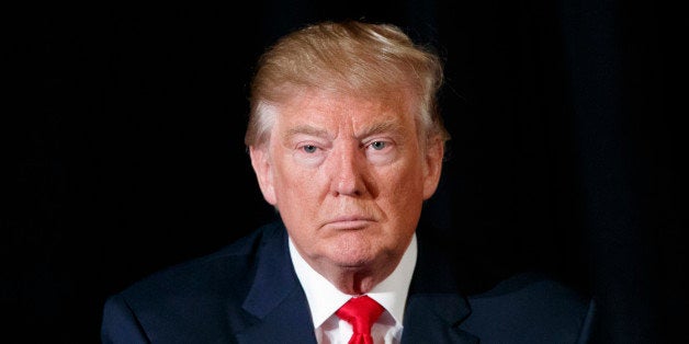 Republican presidential candidate Donald Trump listens to a question during a town hall with the Retired American Warriors, M