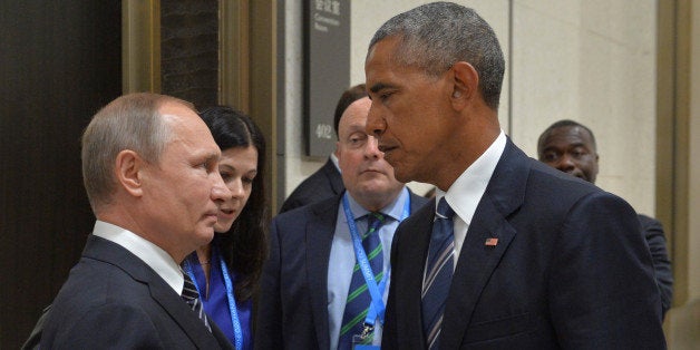 Russian President Vladimir Putin (L) meets with U.S. President Barack Obama on the sidelines of the G20 Summit in Hangzhou, China, September 5, 2016. Sputnik/Kremlin/Alexei Druzhinin/via REUTERS ATTENTION EDITORS - THIS IMAGE WAS PROVIDED BY A THIRD PARTY. EDITORIAL USE ONLY. TPX IMAGES OF THE DAY 