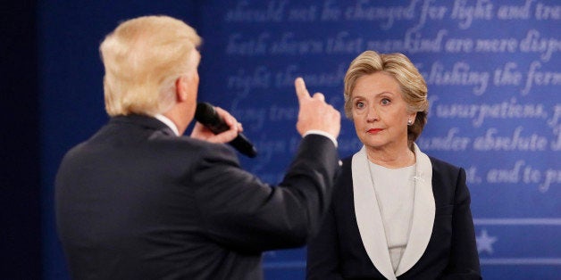 Republican U.S. presidential nominee Donald Trump speaks during the presidential town hall debate with Democratic U.S. presidential nominee Hillary Clinton at Washington University in St. Louis, Missouri, U.S., October 9, 2016. REUTERS/Shannon Stapleton TPX IMAGES OF THE DAY