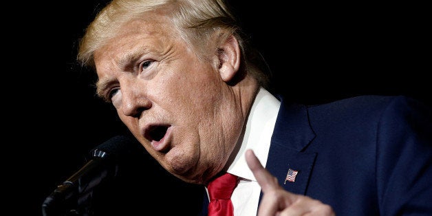 Republican U.S. presidential nominee Donald Trump speaks to the audience at a campaign rally in West Palm Beach, Florida, U.S