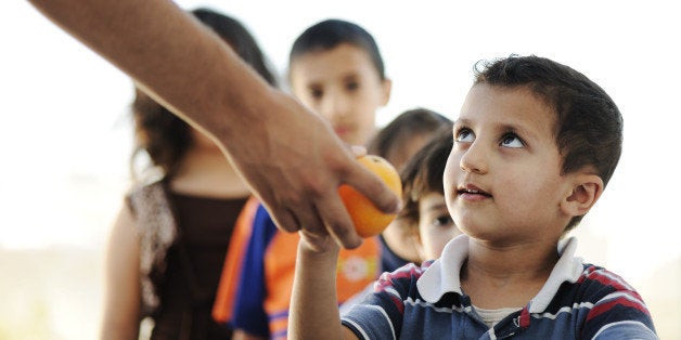 hungry children in refugee camp ...