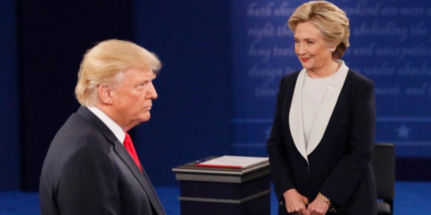 Republican U.S. presidential nominee Donald Trump speaks during the presidential town hall debate with Democratic U.S. presidential nominee Hillary Clinton at Washington University in St. Louis, Missouri, U.S., October 9, 2016. REUTERS/Shannon Stapleton