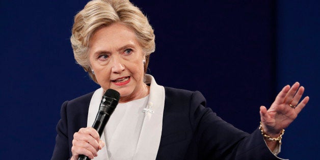 Democratic U.S. presidential nominee Hillary Clinton speaks during her presidential town hall debate against Republican U.S. presidential nominee Donald Trump (not shown) at Washington University in St. Louis, Missouri, U.S., October 9, 2016. REUTERS/Jim Young 