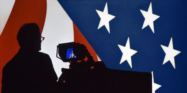 A television cameraman tests his equipment prior to showtime at the Thomas & Mack Center on the campus of the University of