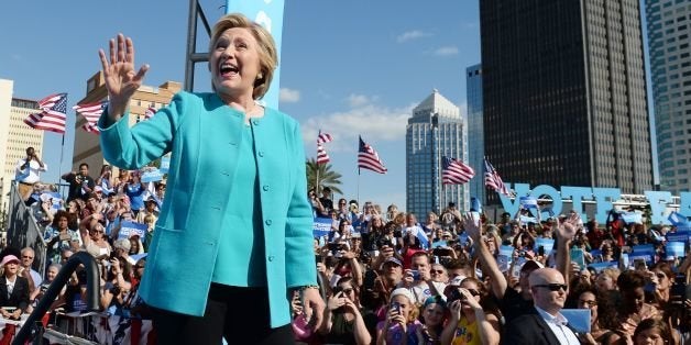 Democratic presidential nominee Hillary Clinton arrives at a rally at Curtis Hixon Waterfront Park in Tampa, Florida, October 26, 2016. / AFP / Robyn BECK (Photo credit should read ROBYN BECK/AFP/Getty Images)