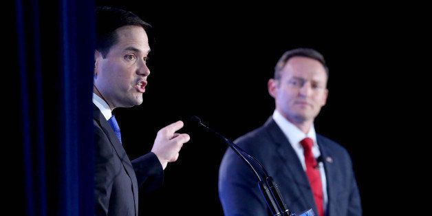 Republican Sen. Marco Rubio makes a point as Democratic challenger Rep. Patrick Murphy listens during the U.S. Senate debate on Monday, Oct. 17, 2016 at the University of Central Florida in Orlando, Fla. (Joe Burbank/Orlando Sentinel/TNS via Getty Images)