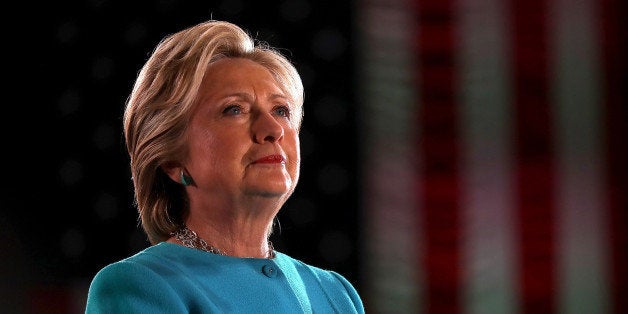 MANCHESTER, NH - NOVEMBER 06: Democratic presidential nominee former Secretary of State Hillary Clinton looks on during a cam