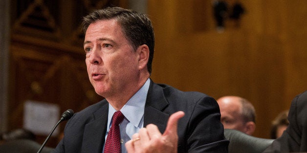 James Comey, director of the Federal Bureau of Investigation (FBI), speaks during a Senate Homeland Security and Governmental Affairs Committee hearing in Washington, D.C., on Tuesday, Sept. 27, 2016. The Department of Homeland Security predicts about 408,000 people will have been caught trying to enter U.S. illegally through southern border during FY16, DHS Secretary Jeh Johnson said. Photographer: Zach Gibson/Bloomberg via Getty Images