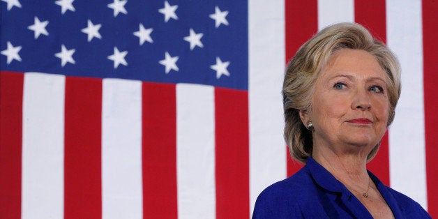 U.S. Democratic presidential nominee Hillary Clinton listens as she is introduced at a campaign rally in Las Vegas, Nevada, U