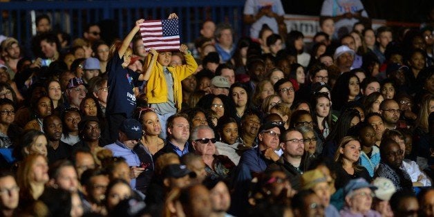 CHARLOTTE, UNITED STATES - NOVEMBER 04: Supporters are seen during a presidential election campaign rally, supporting Democra