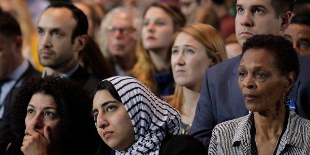 Guests watch television monitors during Democratic presidential nominee Hillary Clinton's election night rally in the Jacob Javits Center glass enclosed lobby in New York, Tuesday, Nov. 8, 2016. (AP Photo/Frank Franklin II)