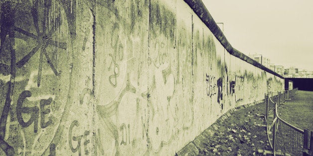 Retro sepia The Berlin Wall (Berliner Mauer) in Germany