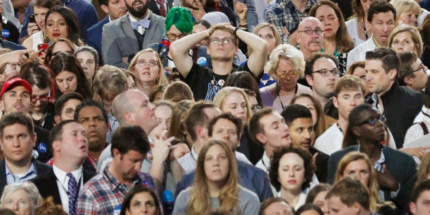 Guests at Democratic presidential candidate Hillary Clinton's election night rally watch returns at the Jacob K. Javits Convention Center in New York, U.S., November 8, 2016. REUTERS/Rick Wilking 