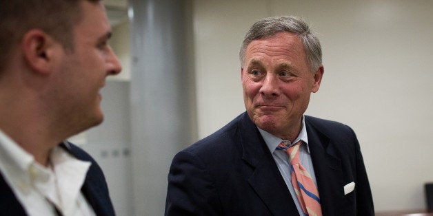 WASHINGTON, DC - MAY 9: At right, Sen. Richard Burr (R-NC) speaks with reporters after a vote at the U.S. Capitol, May 9, 2016, in Washington, DC. Senate Democrats defeated a procedural vote on an energy bill, which increases funding for the Department of Energy and Army Corps of Engineers. (Photo by Drew Angerer/Getty Images)