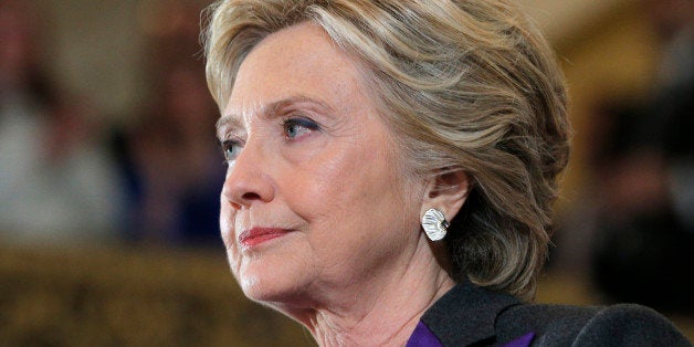 Hillary Clinton pauses as she addresses her staff and supporters about the results of the U.S. election at a hotel in the Manhattan borough of New York, U.S., November 9, 2016. REUTERS/Brian Snyder 