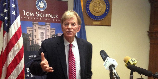 Former leader of the Ku Klux Klan David Duke speaks to media at the Louisiana Secretary of State's office after filing to run