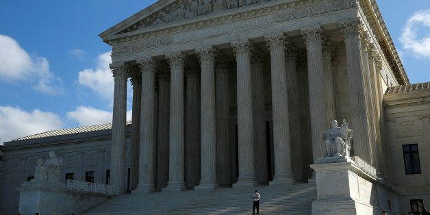 Visitors enter the U.S. Supreme Court in Washington, U.S. October 5, 2016. REUTERS/Gary Cameron