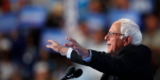Former Democratic Presidential candidate, Sen. Bernie Sanders, I-Vt., gestures as he speaks during the first day of the Democratic National Convention in Philadelphia , Monday, July 25, 2016. (AP Photo/Paul Sancya)