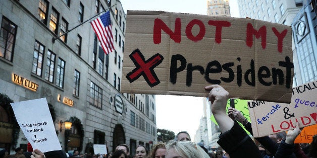 NEW YORK, NY - NOVEMBER 13: Thousands of anti-Donald Trump protesters, including many pro-immigrant groups, hold a demonstration along 5th Avenue as New Yorkers react to the election of Donald Trump as President of the United States on November 13, 2016 in New York City. People around the country and the world are stunned with the outcome of the election for the 45th president. (Photo by Spencer Platt/Getty Images)