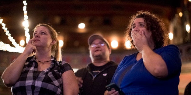 KANSAS CITY, MO - NOVEMBER 08: Tammy Wallace (L-R), Ricardo Falciola and Allie Zaroor, supporters of Jason Kander and Hillar