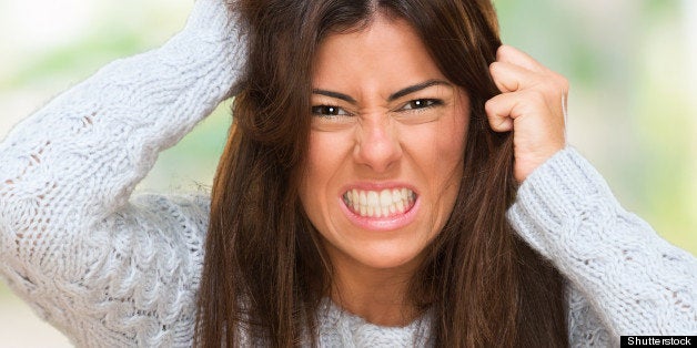 Portrait Of A Young Angry Woman at her home