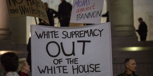 People protest the appointment of white nationalist alt-right media mogul, former Breitbart News head Steve Bannon, to be chief strategist of the White House by President-elect Donald Trump on November 16, near City Hall in Los Angeles, California. / AFP / DAVID MCNEW (Photo credit should read DAVID MCNEW/AFP/Getty Images)