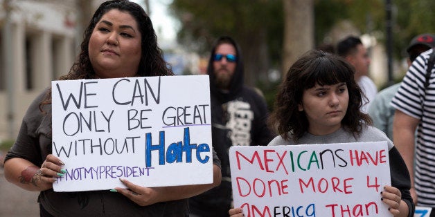 Demonstrators from the San Fernando Valley area gathered to protest President-elect Donald Trump in Los Angeles, California on November 19, 2016. (Photo by Ronen Tivony/NurPhoto via Getty Images)