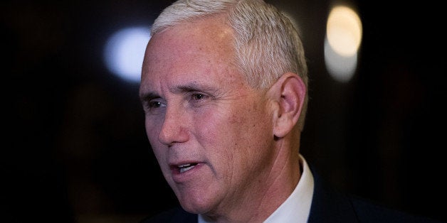 NEW YORK, NY - NOVEMBER 18: Vice President-elect Mike Pence stops and speaks briefly to reporters at Trump Tower, November 18