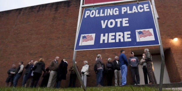 Voters wait in line at a polling station in Greenville, South Carolina, February 20, 2016. REUTERS/Rainier Ehrhardt