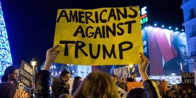 MADRID, SPAIN - 2016/12/02: American community in Madrid protesting against USA President-elect Donald Trump. (Photo by Marcos del Mazo/LightRocket via Getty Images)