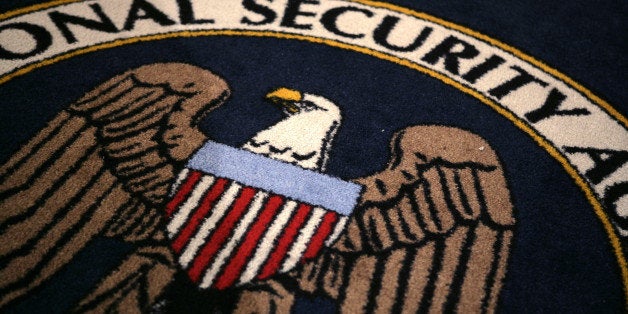 The logo of the U.S. National Security Agency is seen during a visit by U.S. President George W. Bush to the agency's installation in Fort Meade, Maryland, January 25, 2006. Bush met with workers and made remarks on American national security at the high-security installation, which he last visited in 2002. (Photo by Brooks Kraft LLC/Corbis via Getty Images)