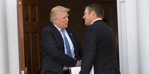 President-elect Donald Trump meets with Kris Kobach at the clubhouse of Trump National Golf Club November 20, 2016 in Bedmins