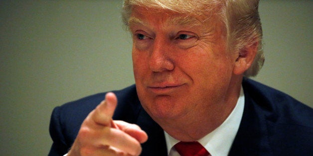 Republican U.S. presidential nominee Donald Trump meets with Cuban-American community leaders at Trump National Doral golf club in Miami, Florida, U.S. October 25, 2016. REUTERS/Jonathan Ernst